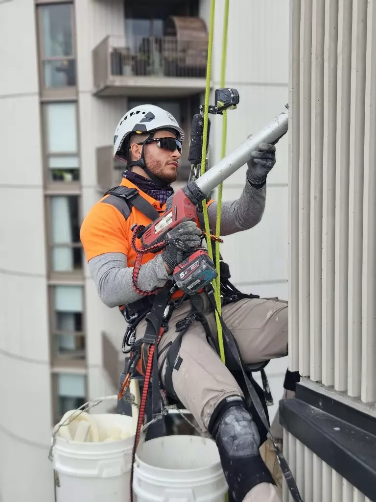 Rope Access Inspect turbine blades for cracks or erosion